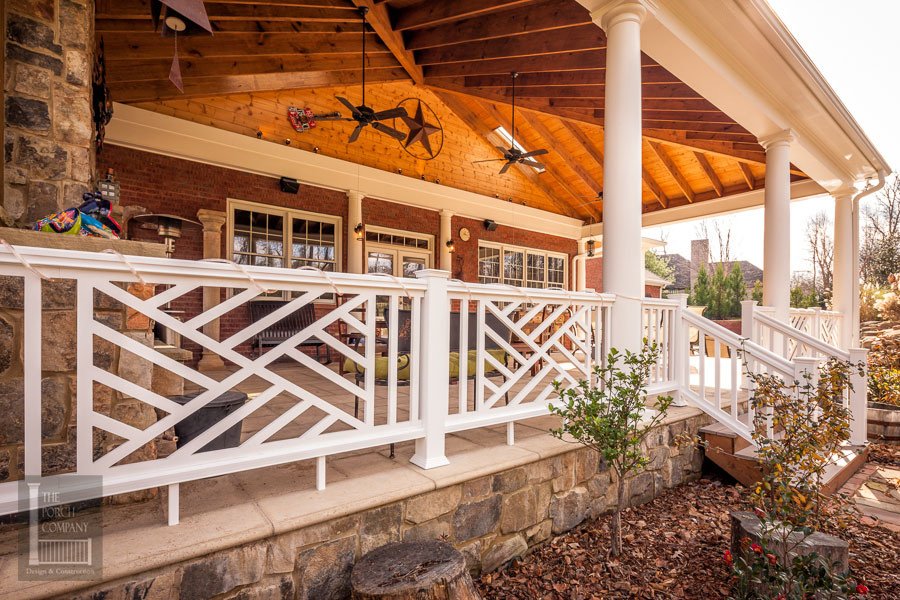 Open Air Porch With Exposed Rafter Ceilings And Chippendale