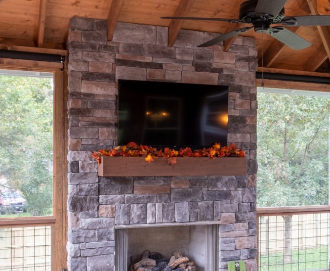 porch-screened-interior-fireplace-fall-details-mantel-exposed-beam