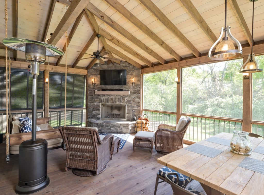 porchscreenedfireplacebedswingdiningban14 The Porch Company