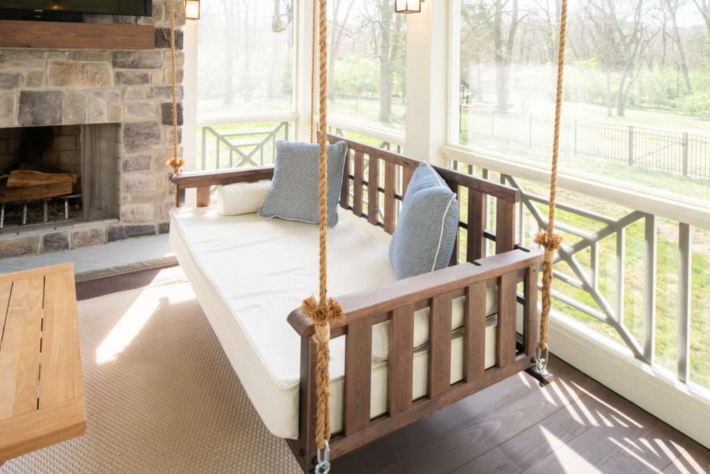 porch-screened-craftsman-bed-swing-brown-fireplace-hearth