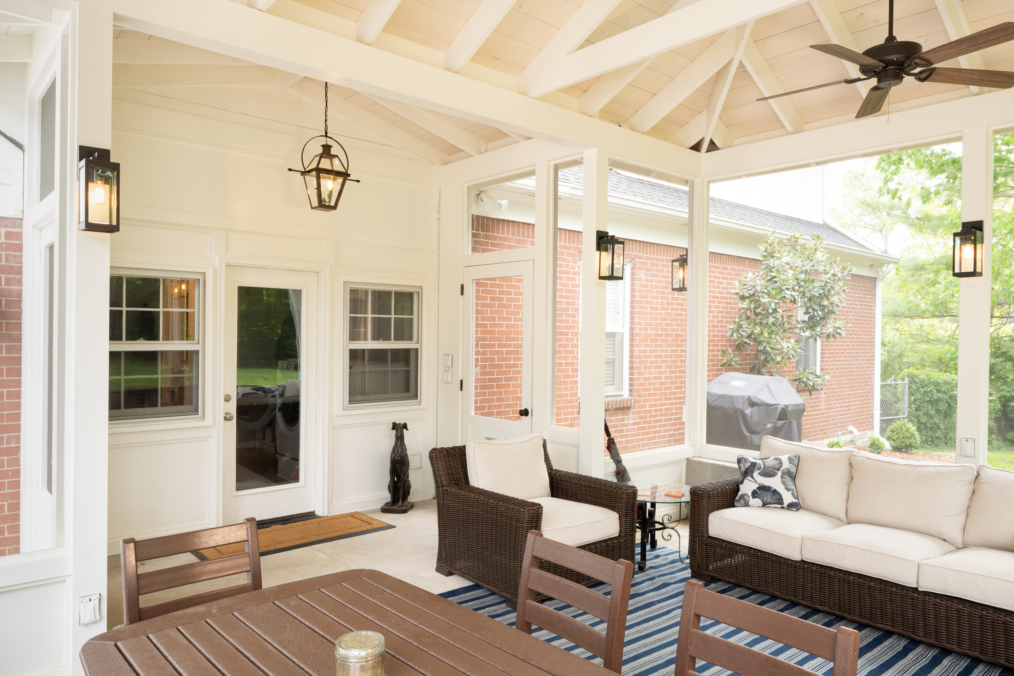 porch-screened-interior-living-dining-exposed-beams-door-kin-20 - The