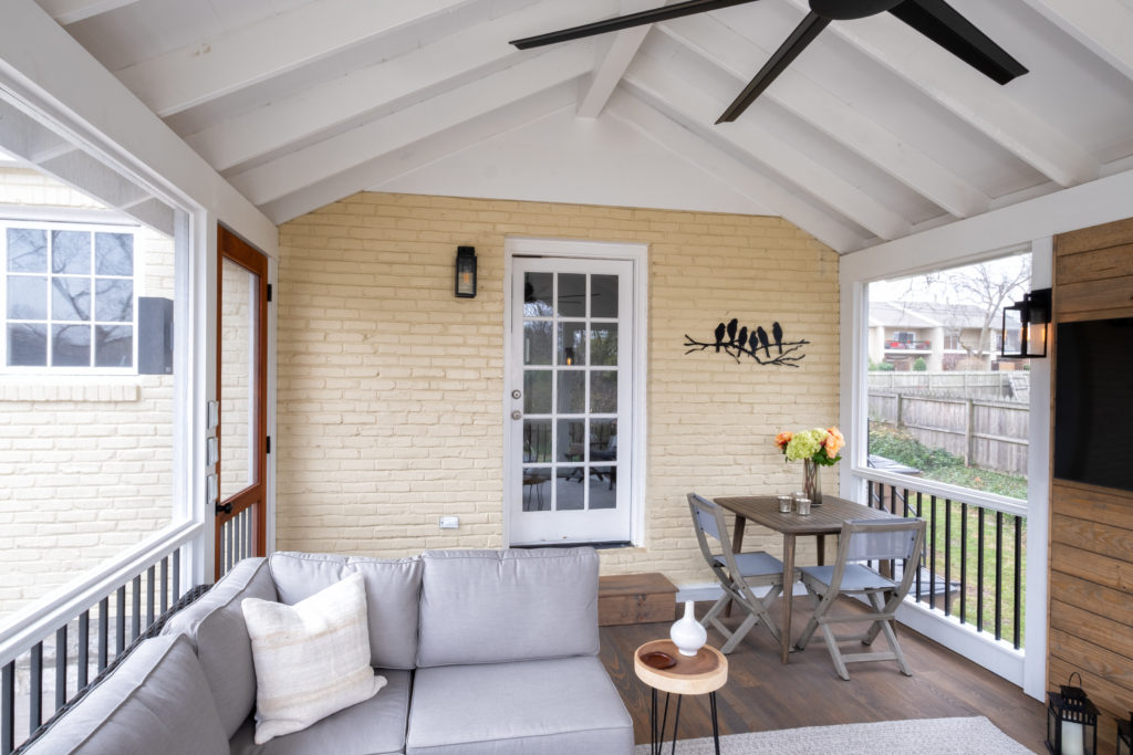 porch-interior-brick-gable-roof-exposed-ceiling-screen-door-sapele-aluminum-spindle-railing