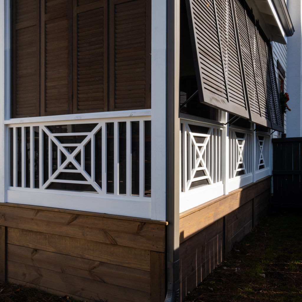 porch-screened-exterior-southern-cross-pvc-railing-shutters-skirting