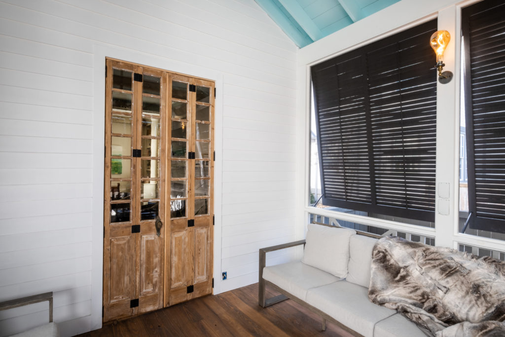 porch-screened-interior-shutters-reclaimed-wood-doors-cypress-flooring