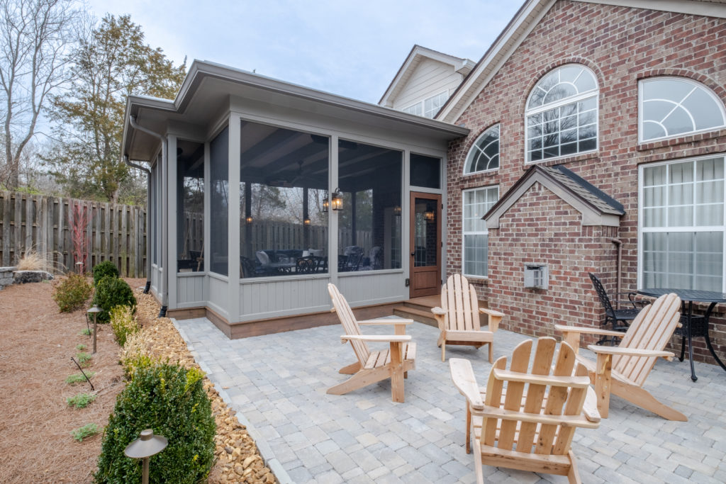 porch-screened-beadboard-wall-pavers-flat-roof