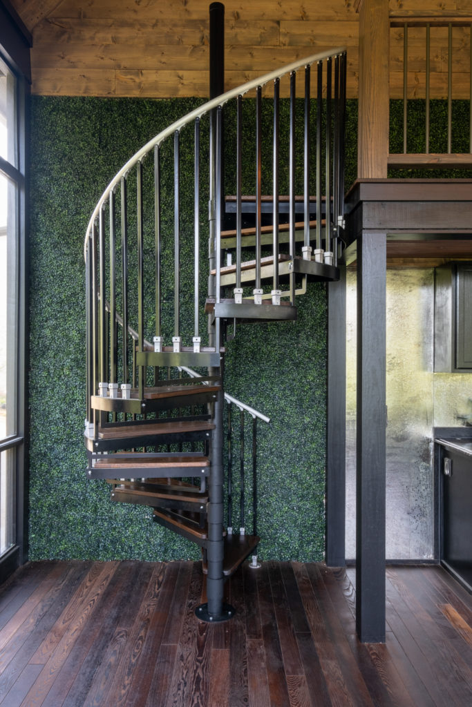 porch-screened-interior-grass-wall-decor-spiral-staircase-ash-floor